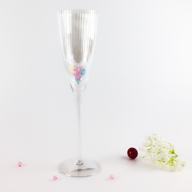 silver champagne glass with caving 