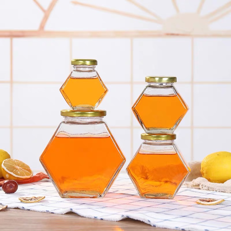 Factory price hexagon glass jars for honey 100ml 180ml 280ml 380ml with metal lid