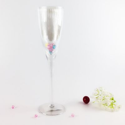 silver champagne glass with caving 